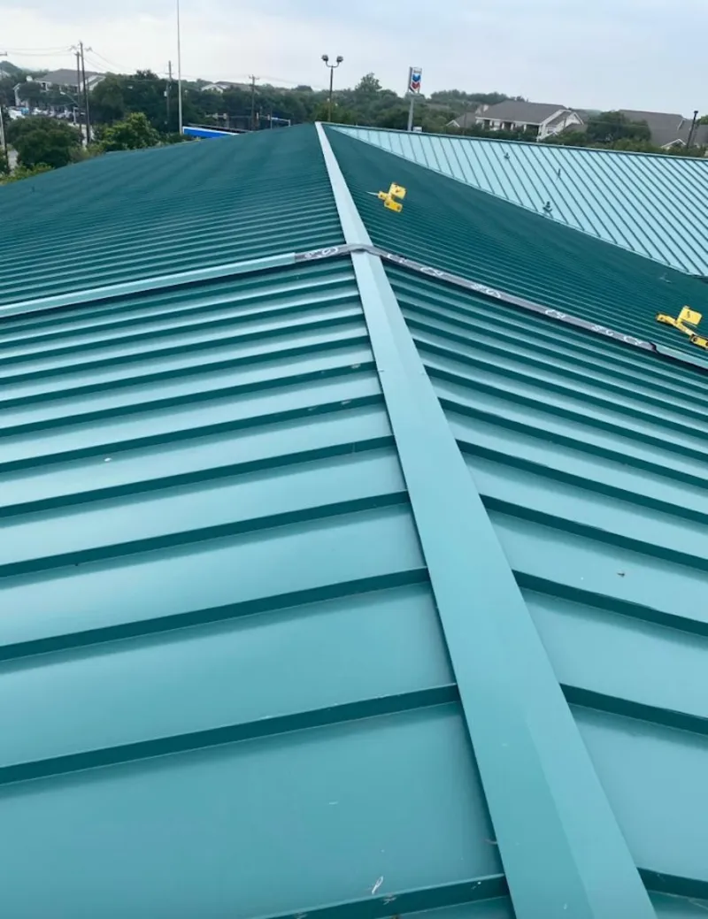 Green commercial metal roof ridge and valley for Metal Roof Repair in Derby